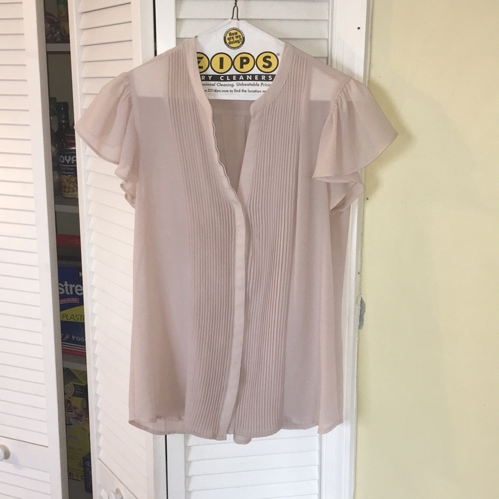 Tan button down shirt